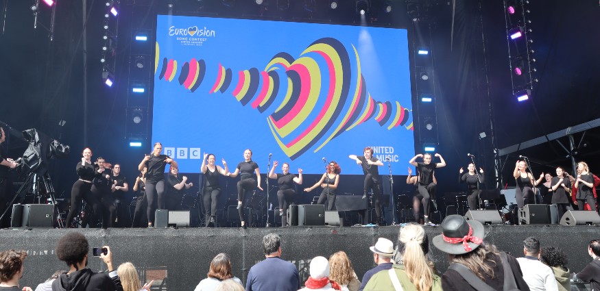 Liverpool Hope University's Musical Theatre Degree Company dance on stage at the Eurovision Village.
